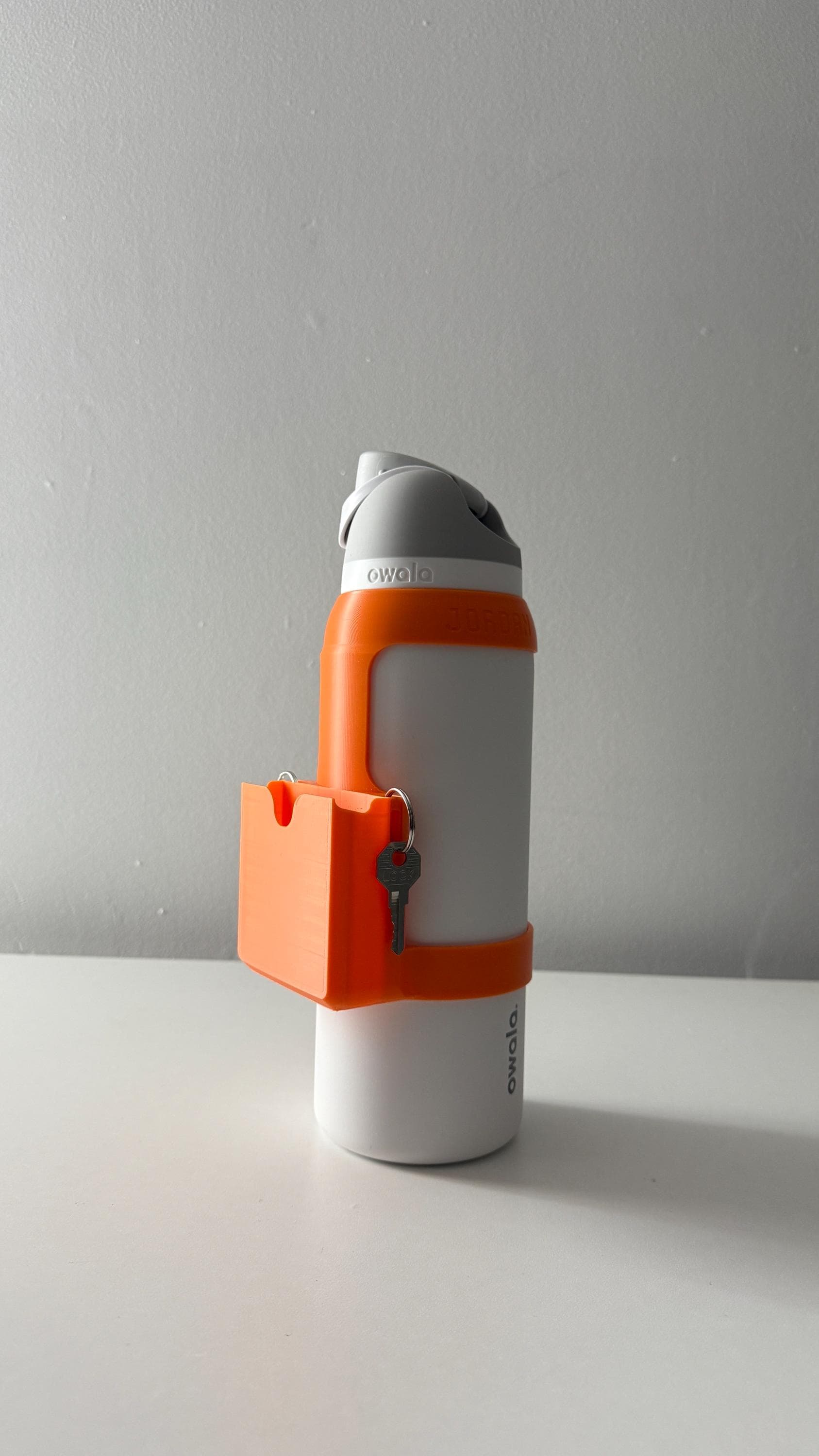 For the Owala FreeSip 40oz Water Bottle - Customizable Name Band with Phone Dock, Carrying Pouch and Dual Key Ring Holder