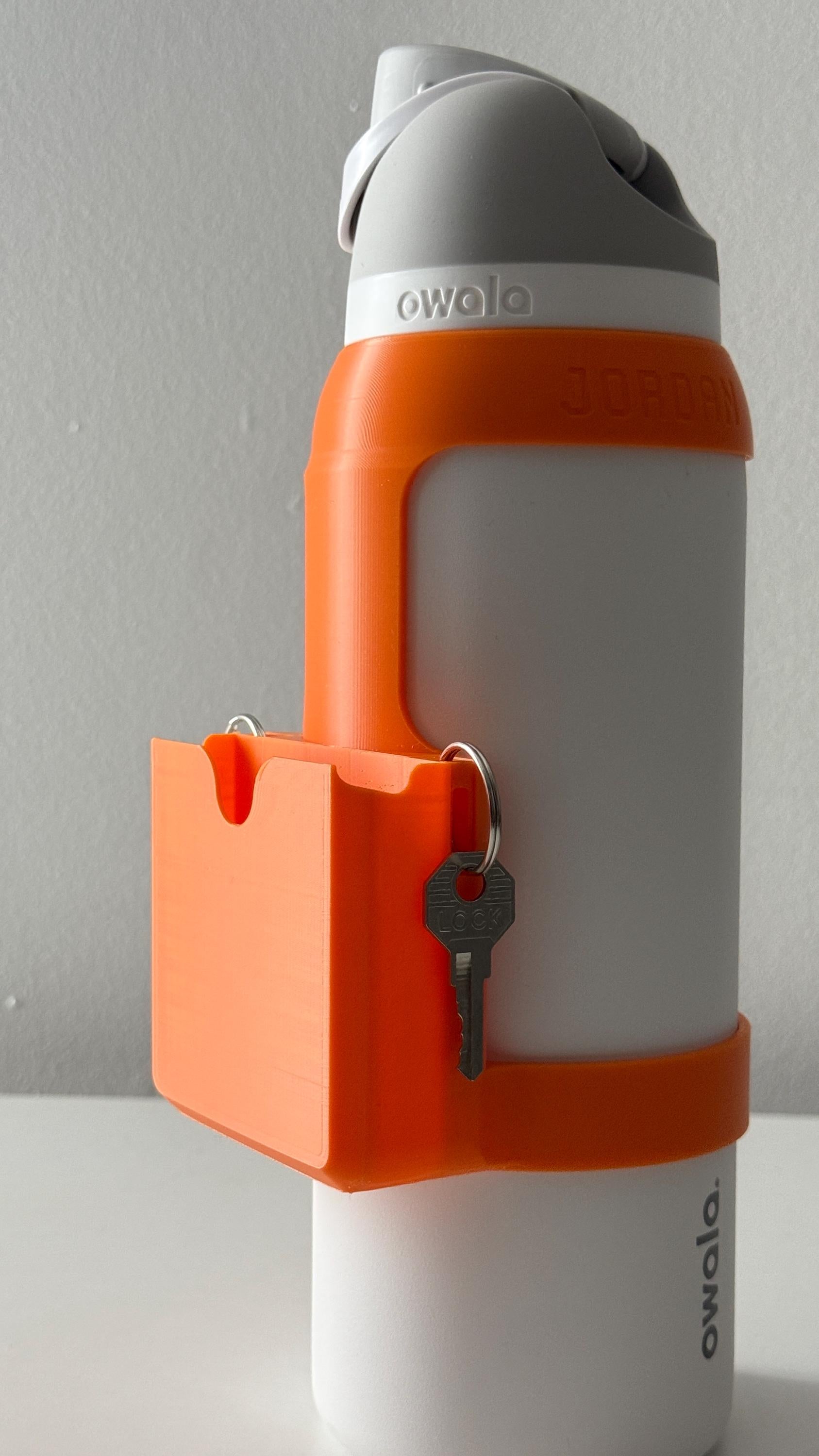 For the Owala FreeSip 40oz Water Bottle - Customizable Name Band with Phone Dock, Carrying Pouch and Dual Key Ring Holder