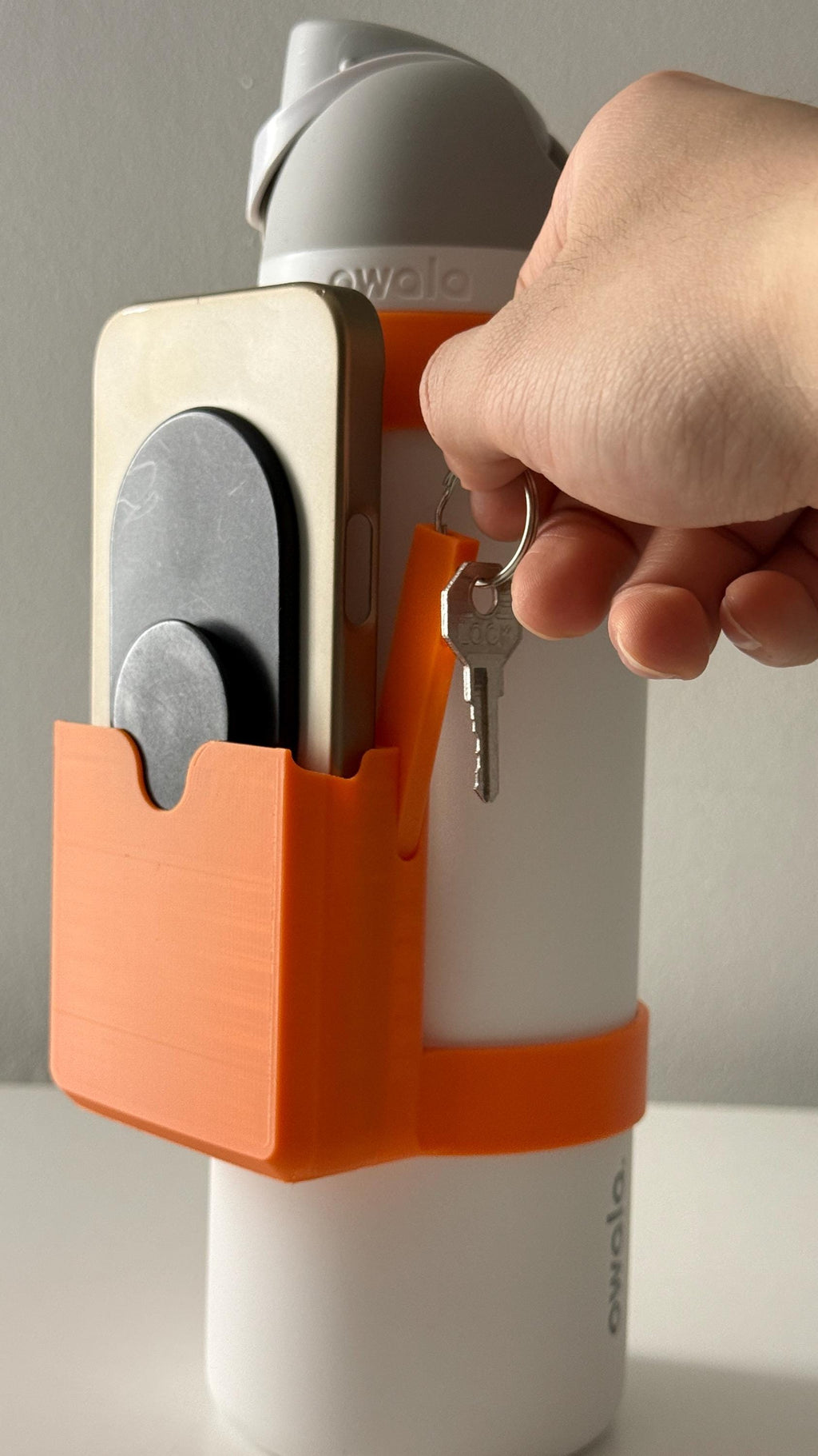 For the Owala FreeSip 40oz Water Bottle - Customizable Name Band with Phone Dock, Carrying Pouch and Dual Key Ring Holder